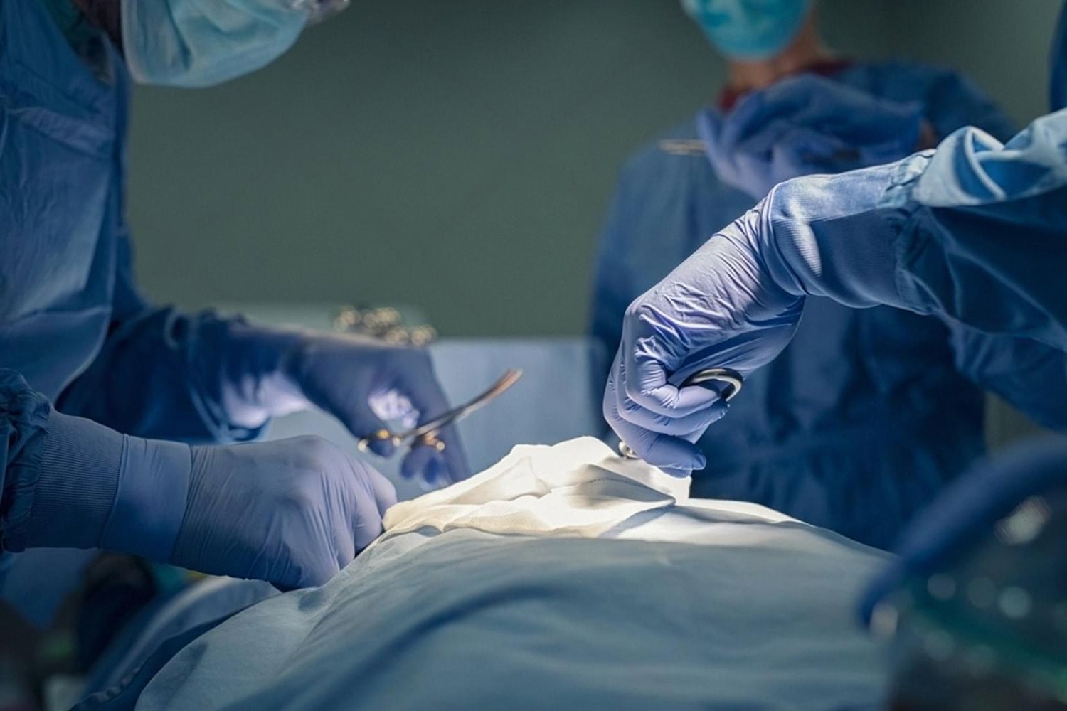 Close-up of surgeons carrying out a laparoscopic weight-loss procedure